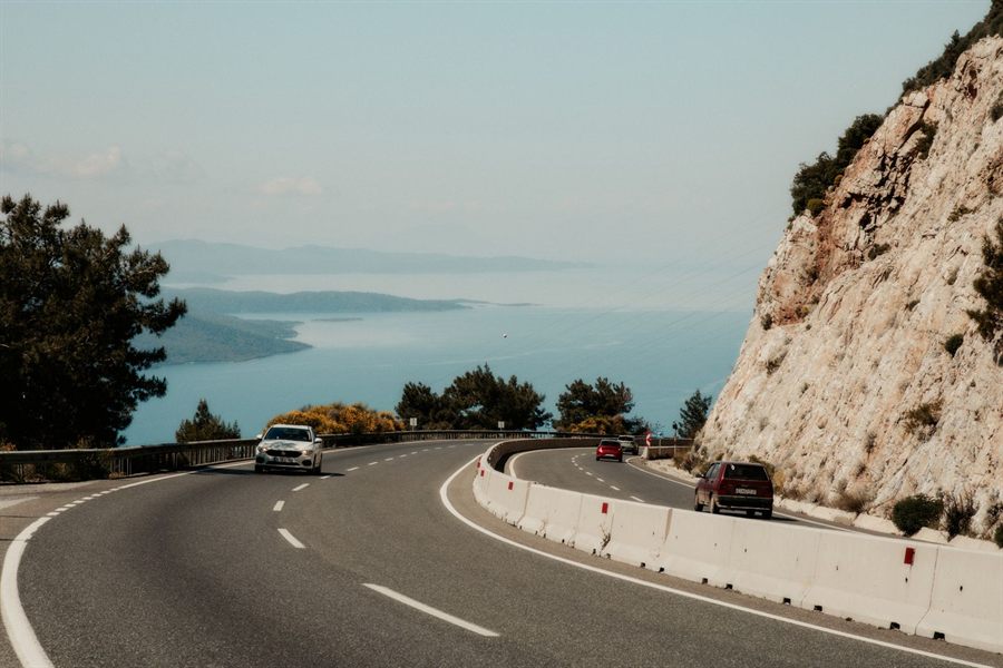 Coastal highway curving along the sea